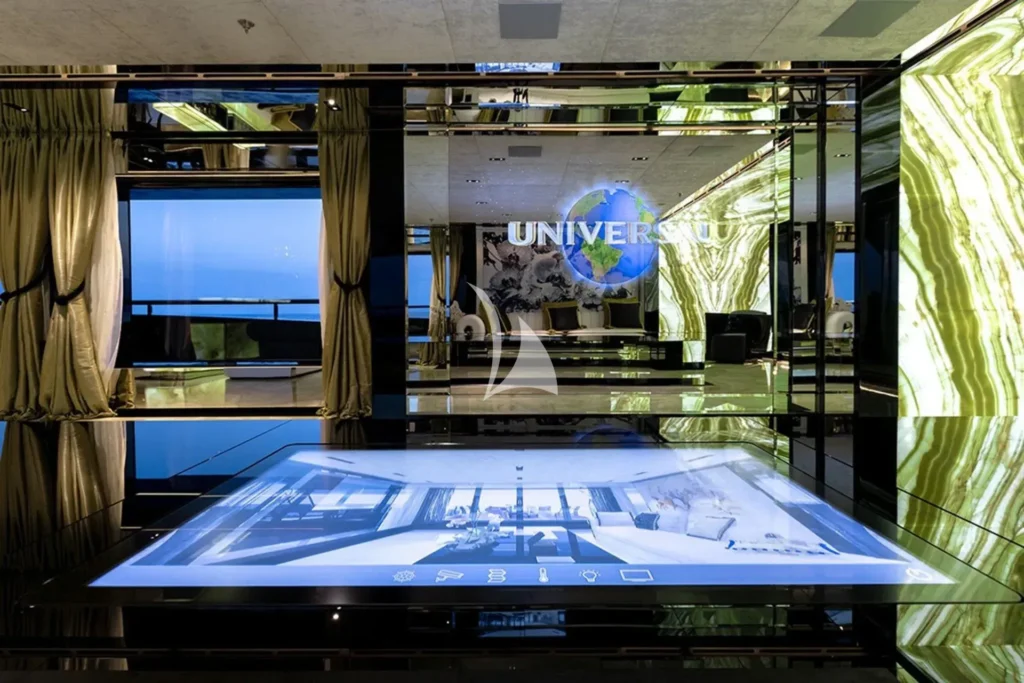 Main salon touch screen remote in the glass table