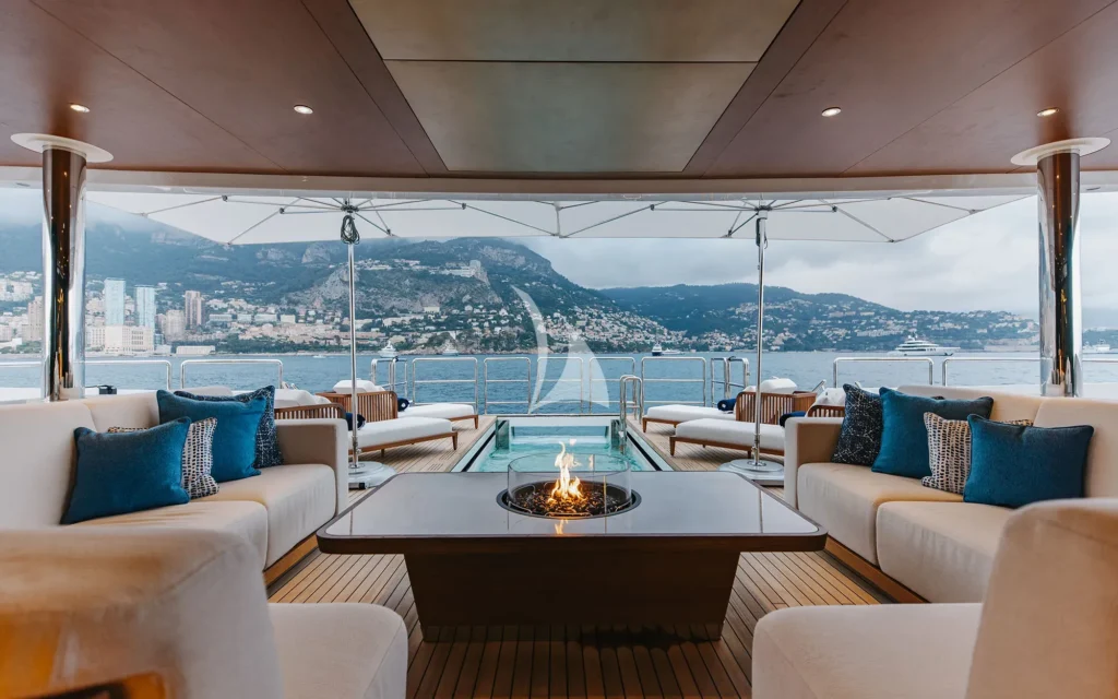 Relaxing on main deck aft, with fire pit